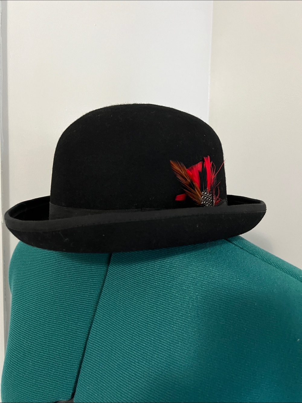 Women's Black Felt Bowler Hat with Red Feather Trim